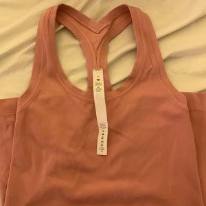Baby pink lululemon top (literally worn twice)